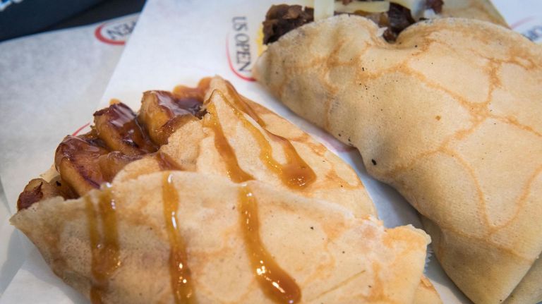 Creperie by Le Chef Paul is a new stand in Food Village, an open-air dining area near Arthur Ashe Stadium. It's serving up sweet and savory crepes with fillings like sweet apples (pictured left), chicken and Dijon sauce and boeuf bourguignon (right). 
