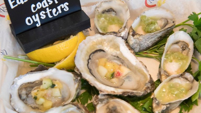 Chef Josh Capon is bringing some of the biggest hits at his SoHo seafood restaurant Lure Fishbar to two oyster bars on the Arthur Ashe Stadium grounds. That includes East and West coast oysters (pictured), and a Lobster BLT with Applewood-smoked bacon and Jersey tomato on a brioche bun, served with a side of salt and vinegar chips.