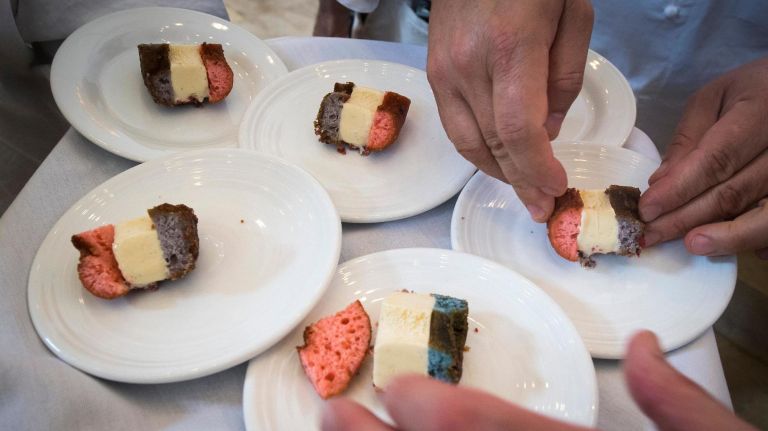 Williamsburg's wildly popular Du's Donuts shop has been drawing rave reviews with its unusual flavors such as Mexican hot chocolate and brown butter key lime. The special Double Berry Ice Cream Sandwich was created especially for the U.S. Open using the colors red and blue. The frozen delight features vanilla bean ice cream sandwiched between a strawberry and blueberry doughnut coated with strawberry and blueberry crumble. It's available at David Chang's Fuku stand in Food Village. 