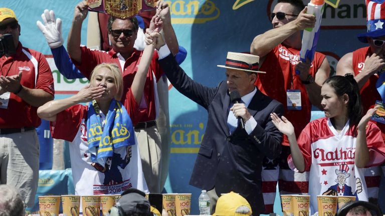 Miki Sudo, left, defeats, Sonya 