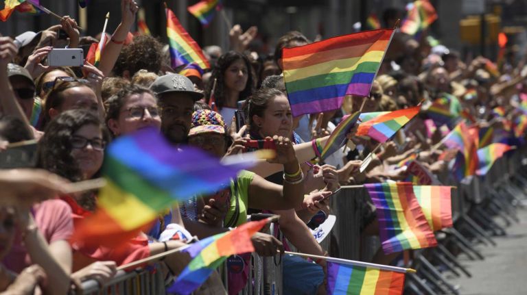 NYC Pride March 2016: See photos of the annual march to commemorate the Stonewall riots 84 Spectators wave flags and cheer at the 2016 New York City Pride March on Fifth Avenue in Manhattan on Sunday, June 26, 2016. This year's Pride parade pays tribute to the 49 killed in the shooting at a gay nightclub in Orlando, Florida, two weeks ago on June 12.