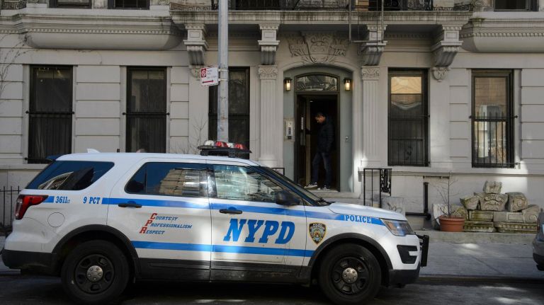 An early-morning fire killed one and injured three Sunday inside this East Village apartment building, officials said.