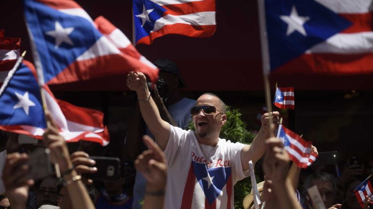 Puerto Rican Day Parade 2016 held in NYC: See photos from the Fifth Avenue festivities 43 Spectators lining Fifth Avenue celebrate during thePuerto Rican Day Parade in Manhattan on Sunday, June 12, 2016.