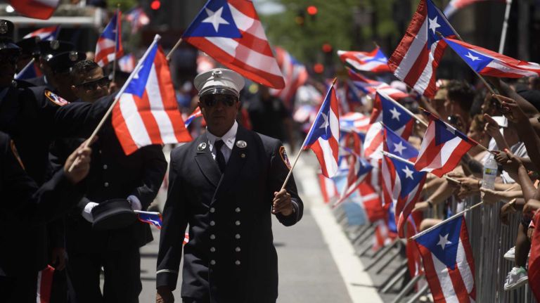Puerto Rican Day Parade 2016 held in NYC: See photos from the Fifth Avenue festivities 47 New York City firefighters march in the 59th annual Puerto Rican Day Parade in Manhattan on Sunday, June 12, 2016.