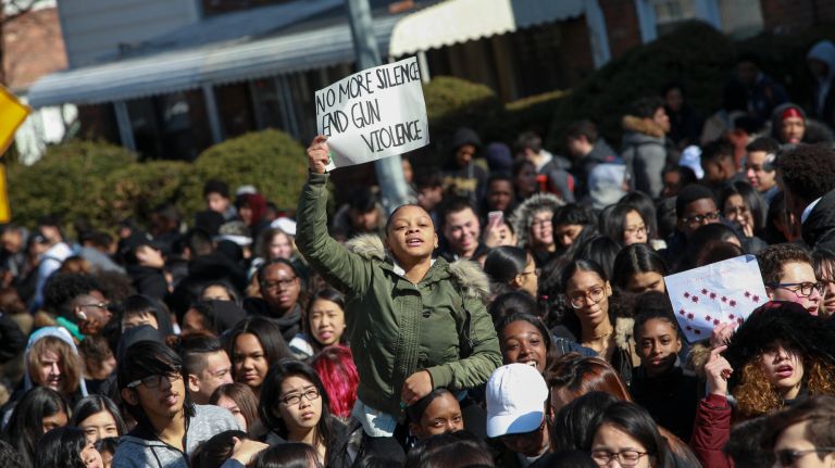 National School Walkout participants at Benjamin N. Cardozo High School in Bayside demonstrate against gun violence outside of the school on Wednesday. 
