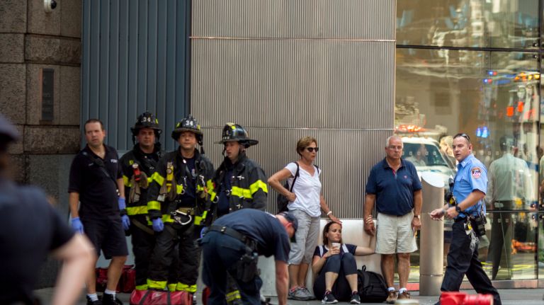 Officials on the scene after a Bronx man jumped a curb and struck a crowd of people in Times Square on May 18, 2017.