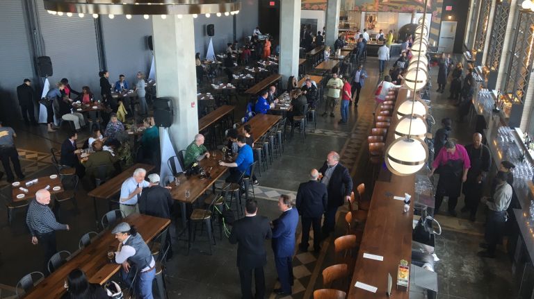 An aerial view shows three of the five restaurants, with the Community Clam Bar serving as a dividing line between Test Kitchen and Parachute Bar.