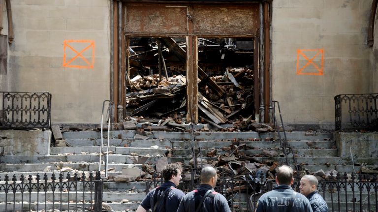 The Beth Hamedrash Hagodol synagogue at 60 Norfolk St. was unoccupied at the time of the fire. Two firefighters suffered minor injuries while battling the flames, the FDNY said.