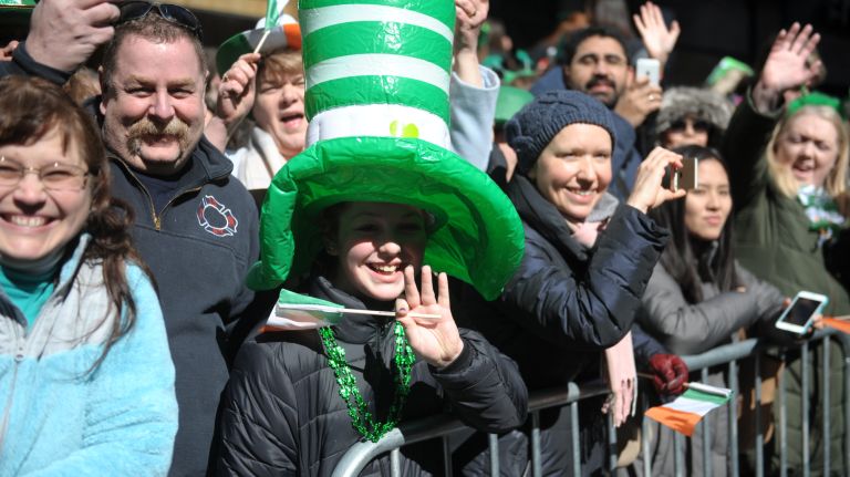 Parade attendees enjoy the St. Patrick's Day parade on Fifth Avenue in Manhattan Friday, March 17, 2017.