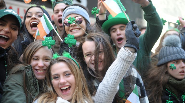 Parade attendees enjoy the St. Patrick's Day parade on Fifth Avenue in Manhattan Friday, March 17, 2017.