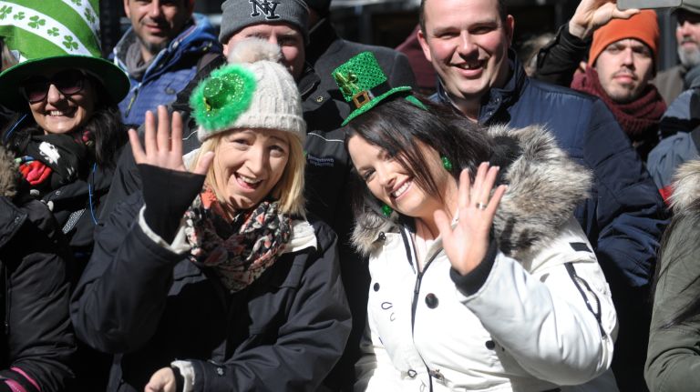 Parade attendees enjoy the St. Patrick's Day parade on Fifth Avenue in Manhattan Friday, March 17, 2017.