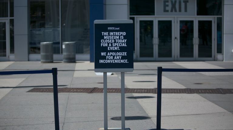 A sign announces the closure of the Intrepid Air and Space Museum, ahead of the president's visit to the decommissioned aircraft carrier on May 4, 2017.