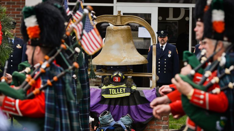 The funeral procession for FDNY firefighter William Tolley outside St. Martin of Tours Roman Catholic Church in Bethpage, Thursday, April 27, 2017.