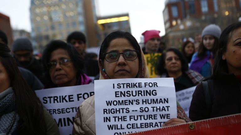 Participants at the International Women's Strike and rally in Washington Square Park, coinciding with International Women's Day, on Thursday, Mar. 8, 2018.