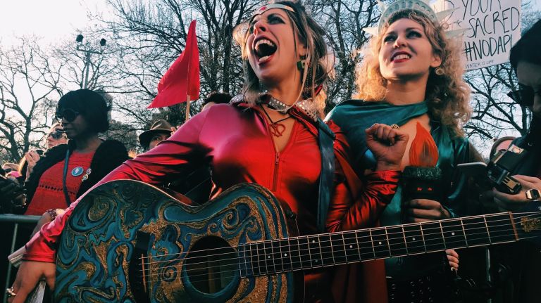 Participants gather at the International Women's Strike rally in Manhattan's Washington Square Park on Wednesday, March 8, 2017.