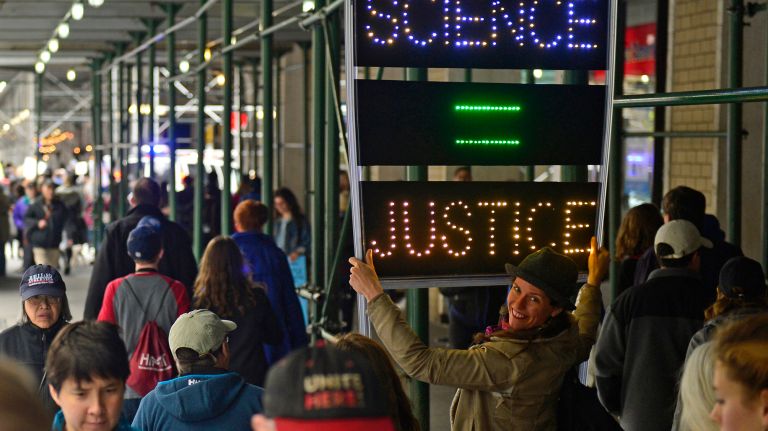 March for Science in NYC: Photos of the Earth Day rally against Trump 26 Athena Soules, 38, of Brooklyn, holds a