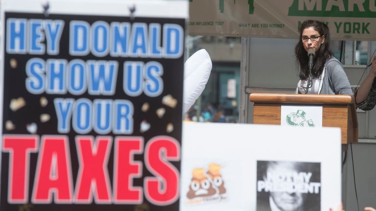 Comedian Sarah Silverman speaks to protesters at Bryant Park during the Tax March on Saturday, April 15, 2017. Actress Kate Walsh was also at the march.