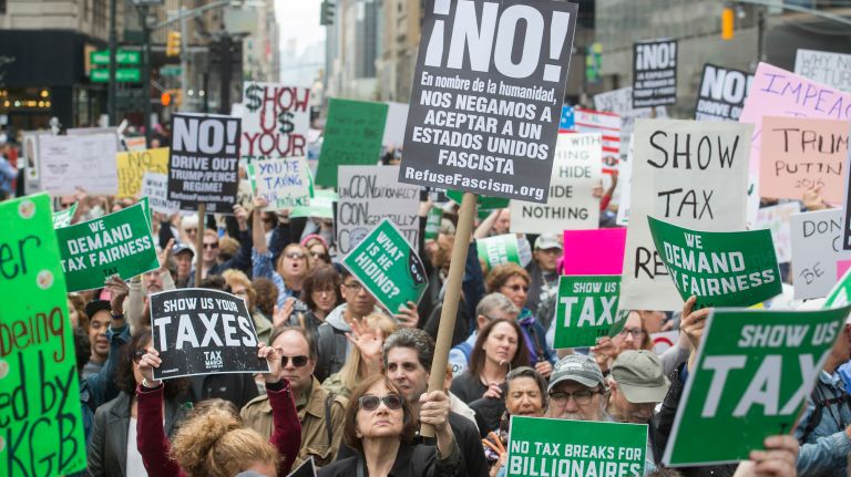 Thousands of protesters rally at Bryant Park during the Tax March on Saturday, April 15, 2017.