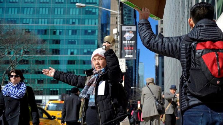 Shigeko Suga (57) from Brooklyn rings a bell during a Silent Peace March in Manhattan on Feb. 18, 2017. About two dozen people marched from Columbus Circle to the Japanese American Church on 7th Ave. to commemorate the Japanese Americans who were held in concentration camps on U.S. soil 75 years ago after President Franklin D. Roosevelt signed executive order 9066 in 1942. The executive order authorized the U.S. military to remove 120,000 people of Japanese descent from their homes on the west coast to inland concentration camps. Most were U.S. citizens at the time of their internment. The march commemorated the day the executive order was signed and was a show of solidarity with Muslim Americans who fear the next executive order could potentially ban them from the U.S.