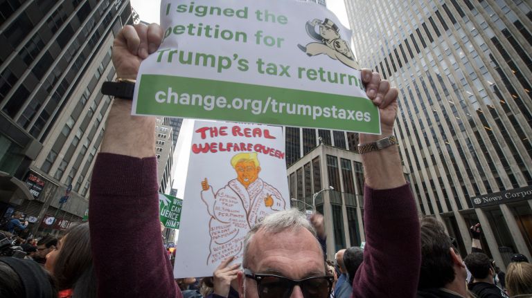 David Bomke, who lives in New York City, joins protesters on Sixth Avenue during the tax march on Saturday, April 15, 2017.