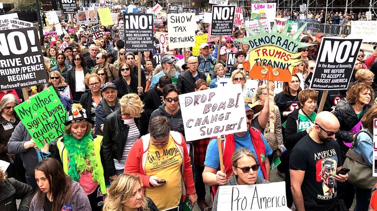 Thousands begin a march from Bryant Park to Trump Tower on April 15, 2017, demanding President Donald Trump release his tax records.