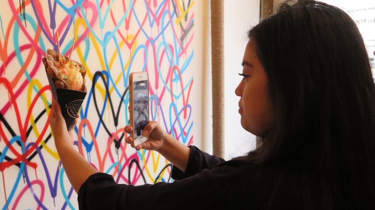 Wowfulls is just as social media friendly as it is delicious. A custom mural from Instagram artist @jgoldcrown, called the #LoveWall, is taking over the interior of the eatery. Customers -- or, #foodies -- are encouraged to snap a photo of their treats in front of the wall. 