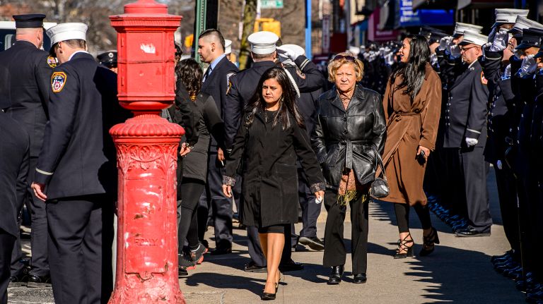 Family members leave the wake for Yadira Arroyo in the Joseph A. Lucchese Funeral Home on Morris Park Avenue in the Bronx, Thursday, March 23, 2017.