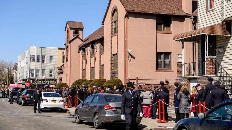 A long line of mourners waits to pay their respects at the wake for Yadira Arroyo in the Joseph A. Lucchese Funeral Home on Morris Park Avenue in the Bronx, Thursday, March 23, 2017.