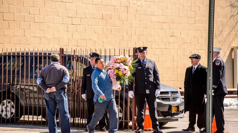 Flowers arrive at the wake for Yadira Arroyo in the Joseph A. Lucchese Funeral Home on Morris Park Avenue in the Bronx, Thursday, March 23, 2017.
