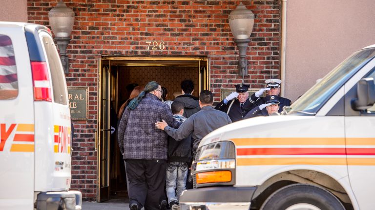 FDNY members line up to honor family members arriving at the wake for Yadira Arroyo in the Joseph A. Lucchese Funeral Home on Morris Park Avenue in the Bronx, Thursday, March 23, 2017.