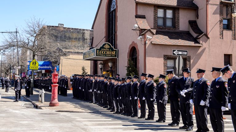 FDNY members line up to honor family members arriving at the wake for Yadira Arroyo in the Joseph A. Lucchese Funeral Home on Morris Park Avenue in the Bronx, Thursday, March 23, 2017.