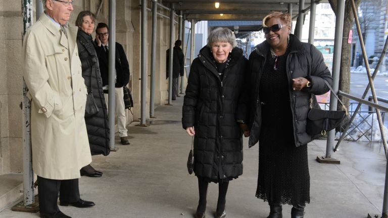 Deirdre Breslin, left, the sister of Pulitzer Prize-winning columnist Jimmy Breslin, arrives for her brother's funeral Mass at the Church of the Blessed Sacrament in Manhattan on Wednesday, March 22, 2017. Breslin was, along with authors such as Tom Wolfe, Gay Talese and Hunter S. Thompson, credited as one of the founders of the 
