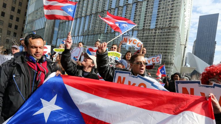 Demonstrators rally outside  FEMA offices in Manhattan as the  agency's temporary hotel vouchers are set to expire on March 20, 2018.