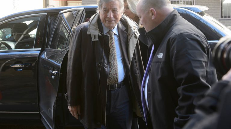 Singer Tony Bennett, left, arrives for Pulitzer Prize-winning columnist Jimmy Breslin's funeral Mass at the Church of the Blessed Sacrament in Manhattan on Wednesday, March 22, 2017. 