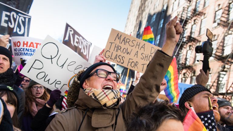 Thousands rallied in front of the Stonewall Inn in Manhattan on Saturday, Feb. 4, 2017, to protest President Donald Trump's ban on travelers from seven Muslim-majority countries.