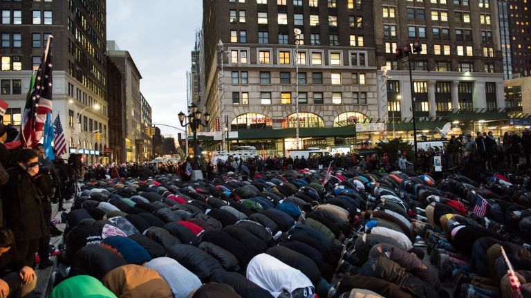 The Yemeni-American community takes part in Muslim prayer outside Brooklyn Borough Hall during a rally against President Donald Trump's immigration travel ban on Feb. 2, 2017.