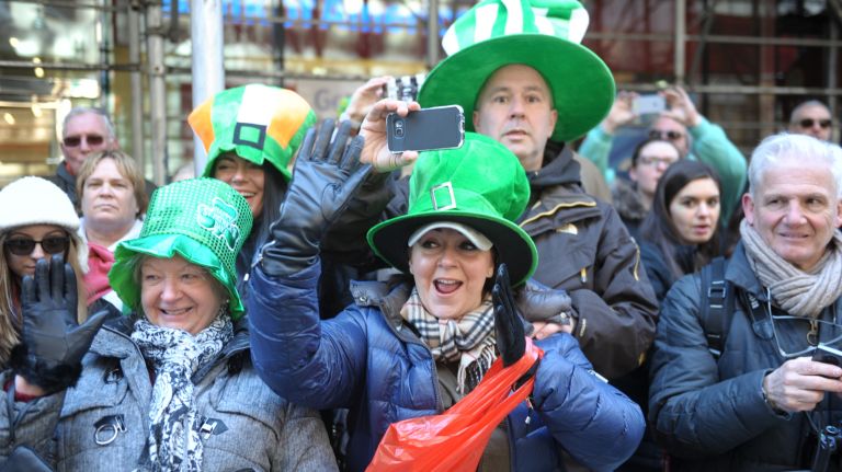 Parade attendees enjoy the St. Patrick's Day parade on Fifth Avenue in Manhattan Friday, March 17, 2017.