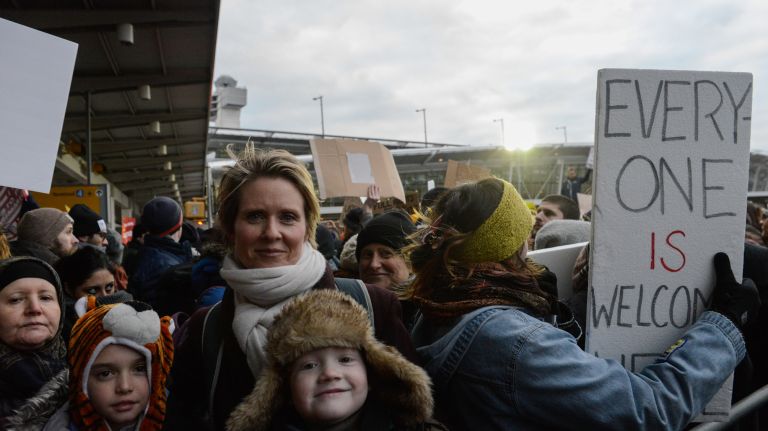 Actress Cynthia Nixon joins protestors at JFK International Airport to rally against Donald Trump's executive order on Jan. 28, 2017.