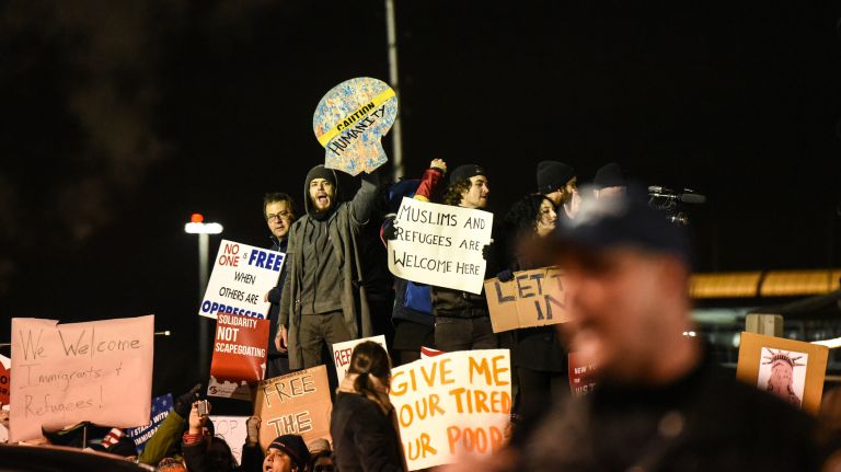 Protesters rally during a demonstration at JFK on Jan. 28, 2017, the day after President Donald Trump signed an executive order barring non-U.S. citizens from seven Muslim-majority nations from entering the country.