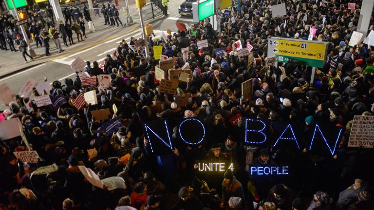 Protesters rally during a demonstration at John F. Kennedy International Airport on Jan. 28, 2017, the day after President Donald Trump signed an executive order barring non-U.S. citizens from seven Muslim-majority nations from entering the country.