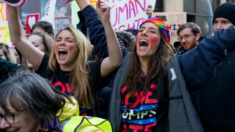 People march on Fifth Avenue near Trump Tower in Manhattan on Saturday, Jan. 21, 2017.