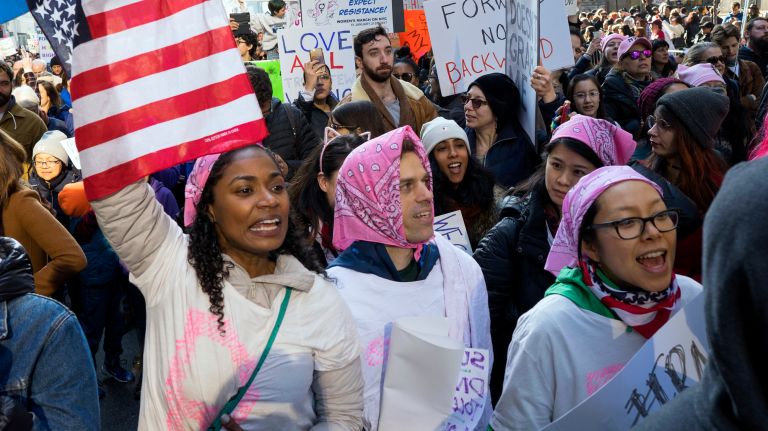 People march on Fifth Avenue in Manhattan on Saturday, Jan. 21, 2017.