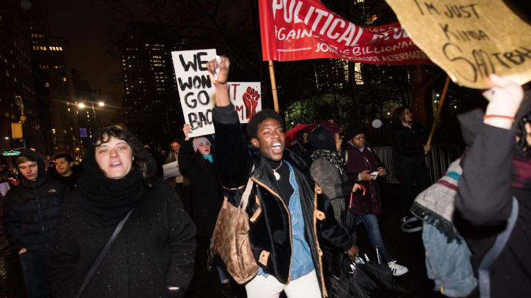 Anti-Trump demonstrators at the rally and march from Foley Square to the Trump Building at 40 Wall St. in Manhattan on Jan. 20, 2017.