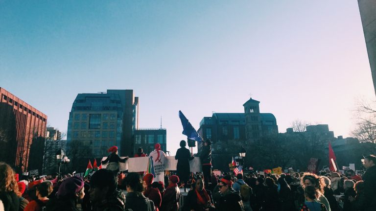 New Yorkers take part in the International Women's Strike rally on Wednesday, March 8, 2017, at Washington Square Park in Manhattan.