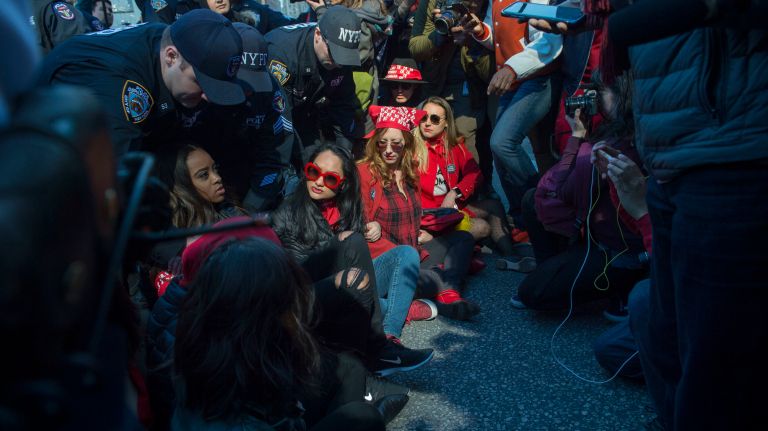 Arrests are made in Manhattan's Columbus Circle, near Trump International Hotel and Tower, during the A Day Without a Woman rally on International Women's Day on Wednesday, March 8, 2017.