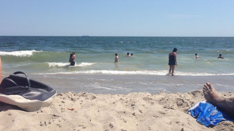 After a 15-year Vitamin D deficiency, Kimmy sure could use a day in the sun. Queens' Rockaway Beach is free, accessible by subway, and full of sunshine.