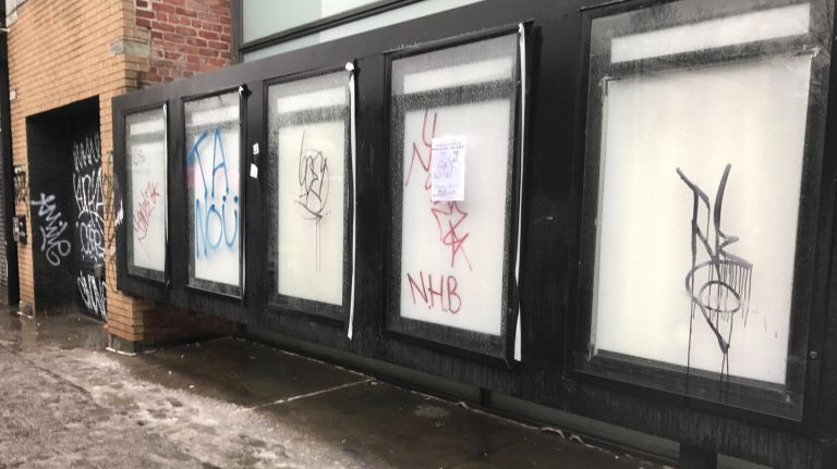 Graffiti covers the empty Sunshine Cinema movie poster frames on Wednesday, Feb. 7, 2018.