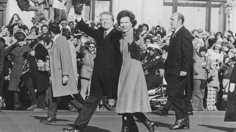 President Jimmy Carter and first lady Rosalynn Carter walk in the inaugural parade on Jan. 20, 1977, in Washington, D.C.