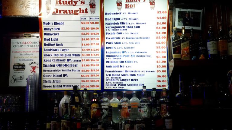 Technically, Rudy's doesn't have a happy hour. But it does have all the ingredients of a killer happy hour -- cheap booze and free food -- available all day long, every day. Grab a free hot dog (or two) and order Rudy's Blonde beer for $3 a pint or $8 a pitcher -- yes, a pitcher of the house beer is the price of a pint in many midtown bars. If you want to kick it up a notch, go for the Rudy's Stimulus Special, $5 for a pint of Rudy's Blonde and a shot of Bushmill's Irish whiskey. The signs on the walls of the dimly lit bar sum up it perfectly: 