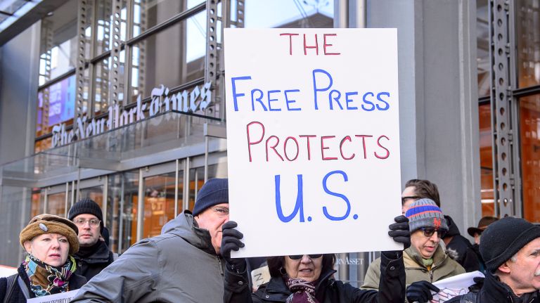 Protesters gather outside the New York Times building in midtown Manhattan for the March for a Free Press on Feb. 26, 2017.